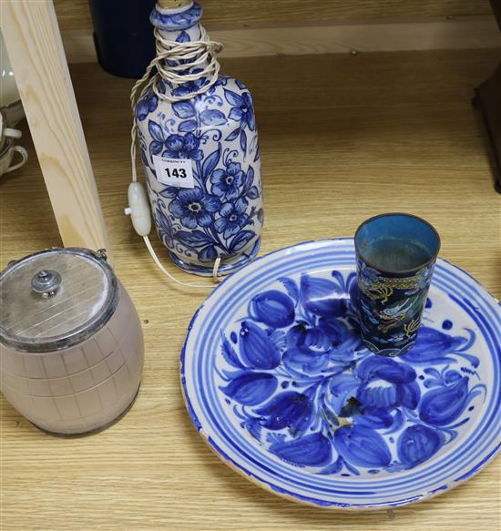 A faience bottle, mounted as a lamp and a similar dish